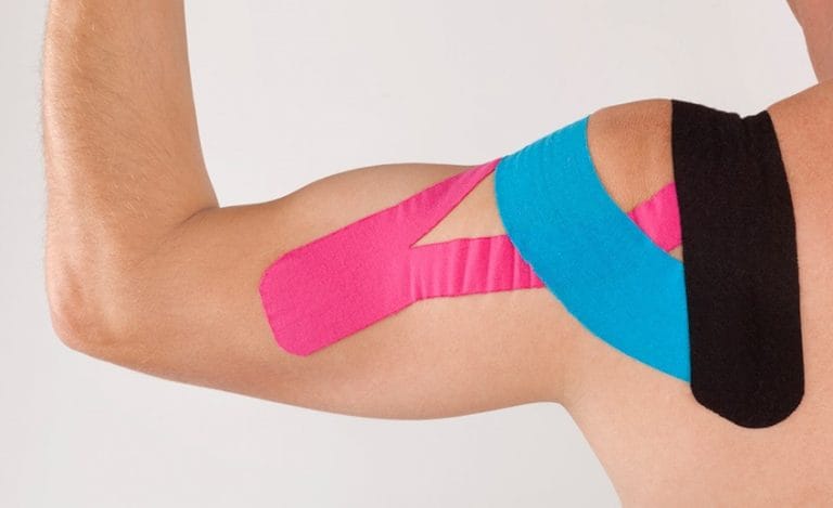 Colorful kinesiology tape on arm